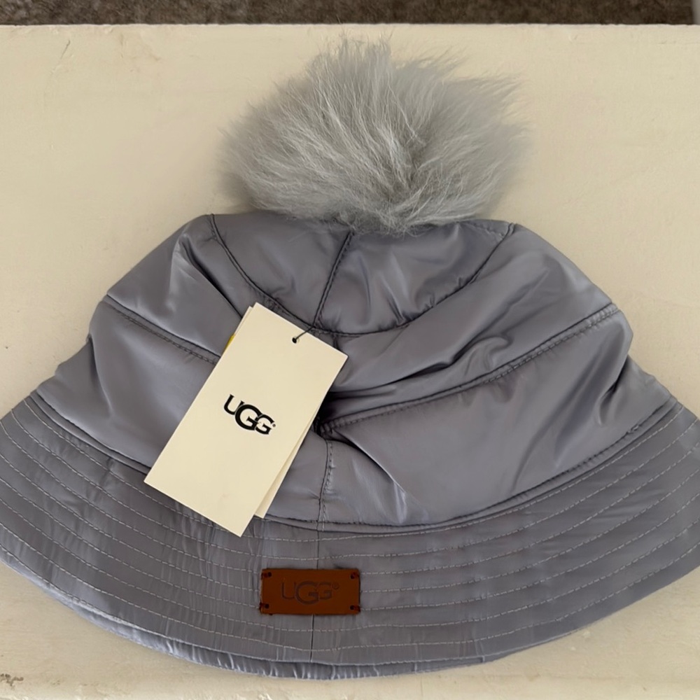 UGG Shiny Silver Bucket Hat with Faux Fur Pom